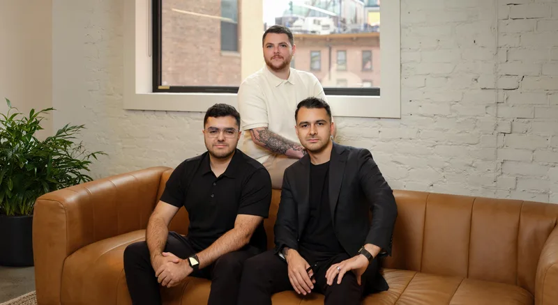The Comp AI founding team together in the office